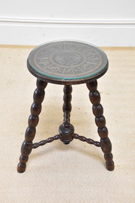 Lot 148 - A 19th century carved oak stool, height 50cm,...