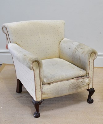 Lot 186 - An early 20th century scroll back armchair...