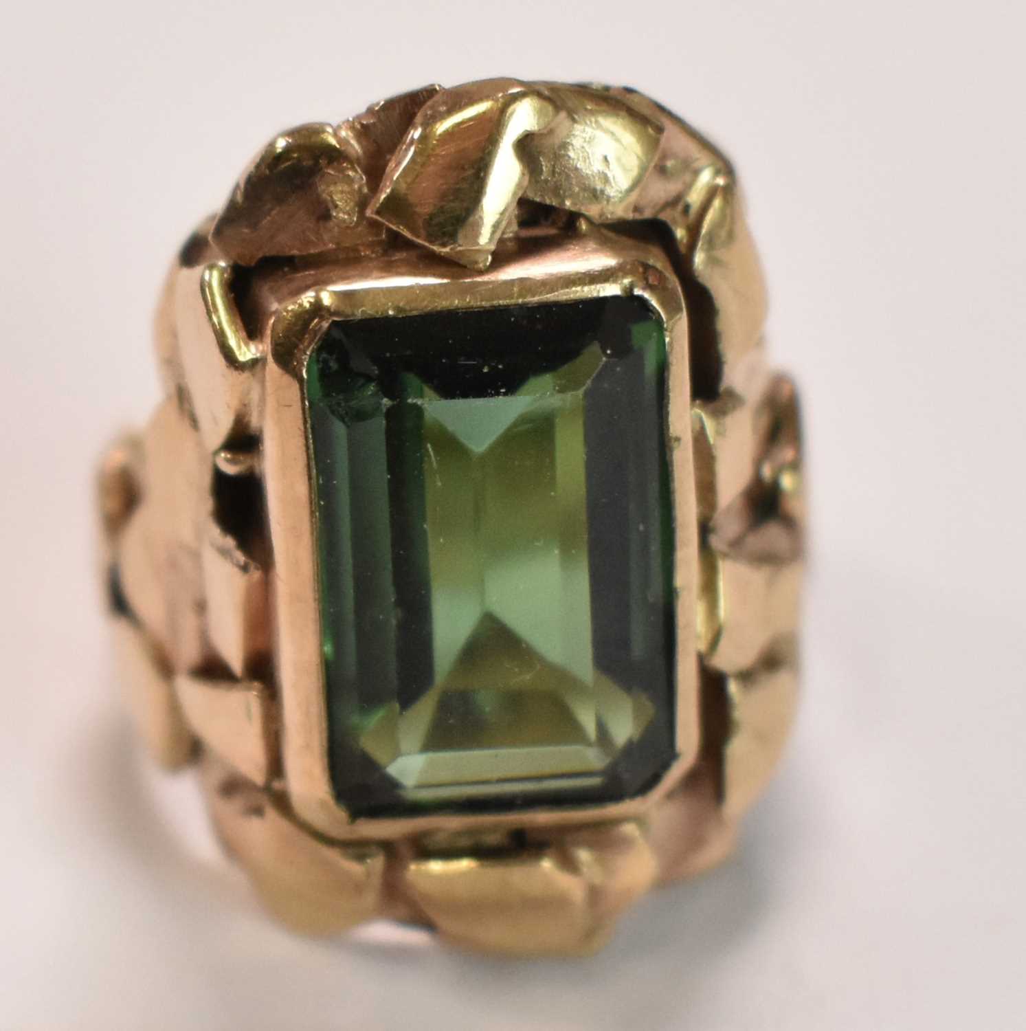 Lot 417 - An unusual textured yellow metal ring set