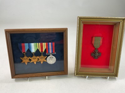 Lot 86 - A set of four re-issued WWII medals, framed...