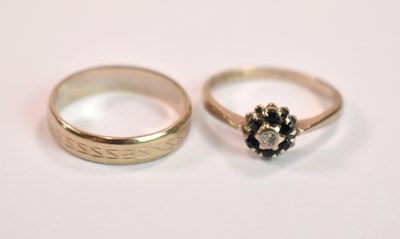 Lot 419 - An 18ct yellow gold floral dress ring, size N...