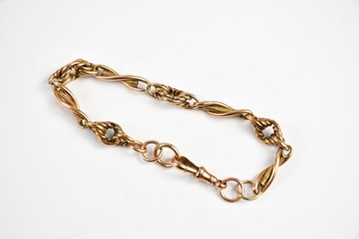 Lot 2489 - A 9ct yellow gold fancy link bracelet, approx...