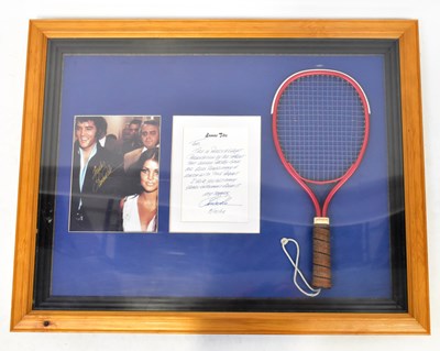 Lot 221 - ELVIS PRESLEY; a framed racquet ball racket...