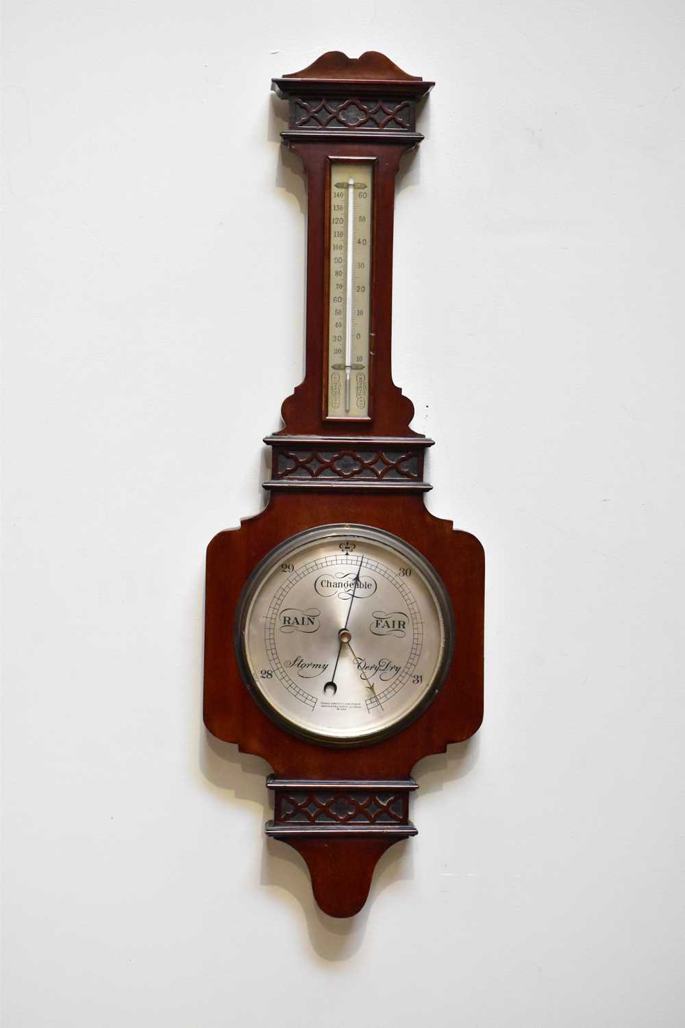 Lot 1448 - A 20th century mahogany android barometer, 85cm.