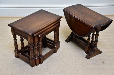 Lot 1113 - A reproduction oak drop-leaf occasional table,...