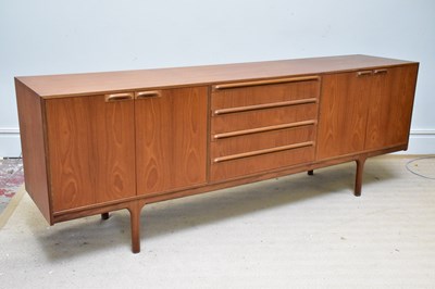 Lot 1006 - MCINTOSH; a mid century teak sideboard with...