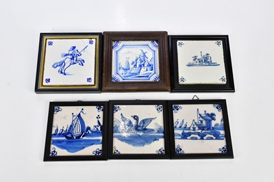 Lot 1429 - A collection of tiles to include four Delft...