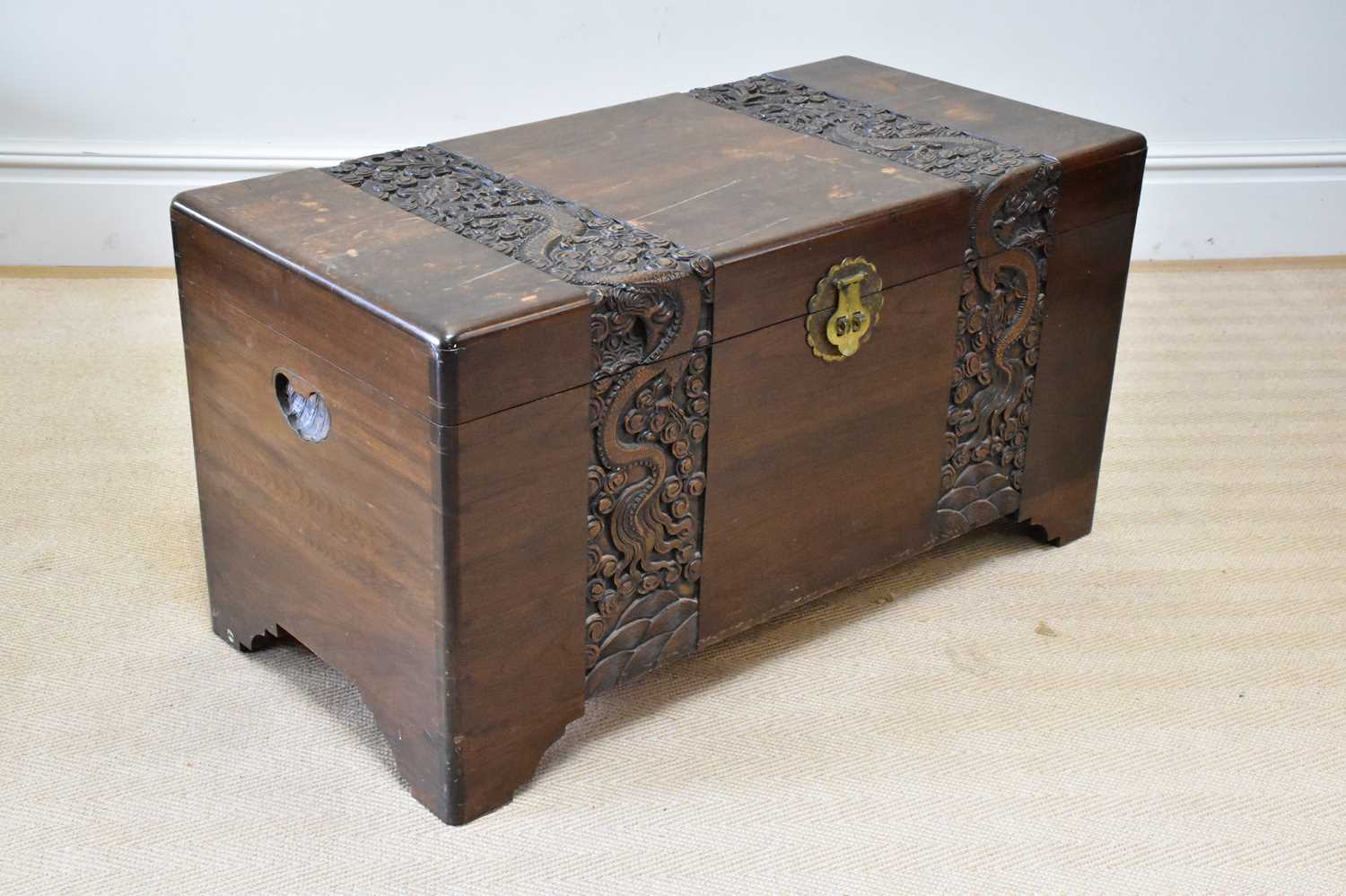 Lot 198 A Chinese carved camphor wood blanket box,