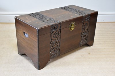 Lot 198 - A Chinese carved camphor wood blanket box,...