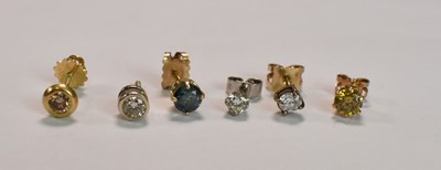 Lot 449 - A group of single stone ear studs comprising...