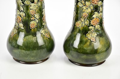 Lot 2426 - ROYAL DOULTON; a large pair of Art Ware vases,...