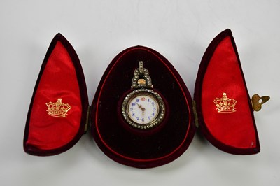 Lot 663 - A cased 18ct yellow gold pendant fob watch,...