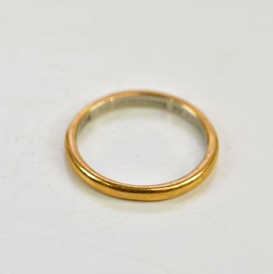 Lot 120 - A platinum and 22ct yellow gold wedding band,...