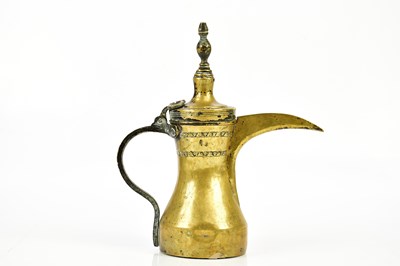 Lot 1320 - An unusual eastern Dallah brass coffee pot,...