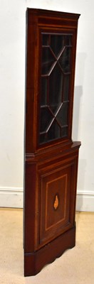 Lot 1276 - An Edwardian inlaid mahogany freestanding...