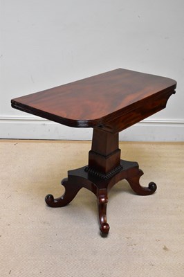 Lot 1267 - A Regency mahogany fold-over tea table, height...