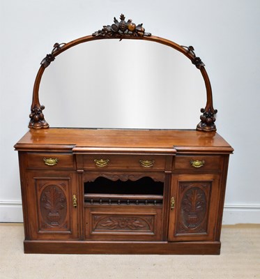 Lot 1184 - A Victorian carved walnut mirror back...