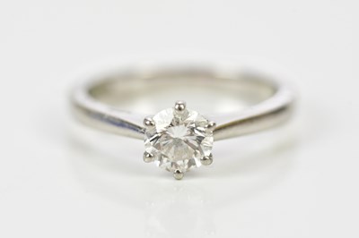 Lot 27 - A platinum and diamond solitaire ring, the six...