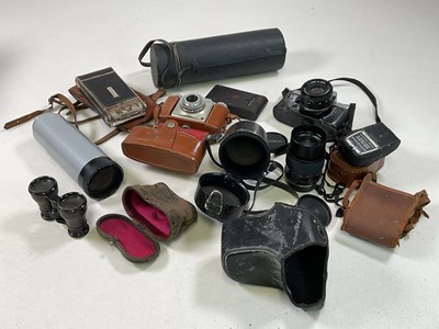 Lot 161 - A collection of various cameras and lenses.