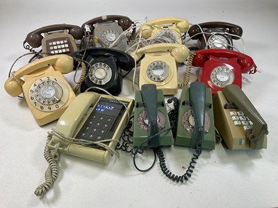 Lot 32 - A quantity of vintage dial telephones and trim...