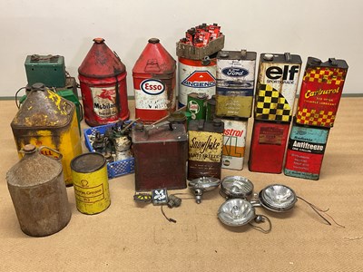 Lot 110 - A collection of automobilia to include oil...