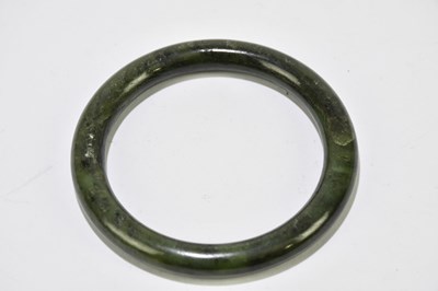 Lot 1282 - Two jade bangles, one diameter 8cm, the other...