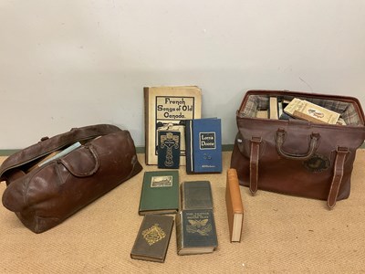 Lot 167 - Two vintage leather bags containing a quantity...