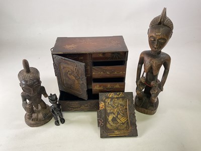 Lot 15 - A Japanese table top cabinet and three wooden...