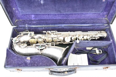 Lot 1119 - THE BUESCHER; a silver plated alto saxophone,...