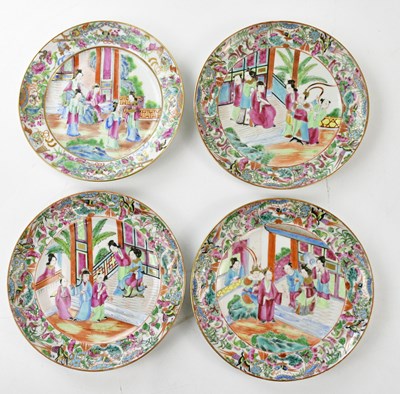 Lot 1208 - A set of four Canton Famille Rose plates,...