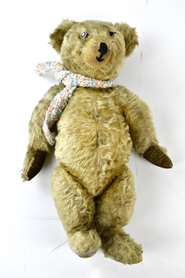 Lot 2619 - A vintage teddy bear with pointed snout,...