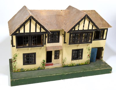 Lot 265 - A double fronted two storey Tudor style doll's...