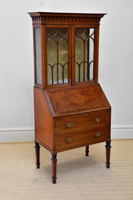 Lot 168 - An Edwardian inlaid mahogany bureau bookcase...