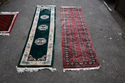 Lot 451 - A Bokhara type wool runner, 306 x 80cm, with a...