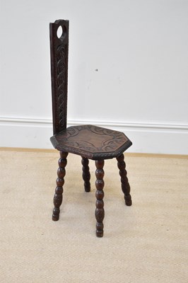 Lot 118 - An early 20th century carved oak spinning...