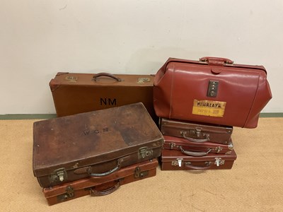 Lot 105 - A collection of vintage suitcases (7 )