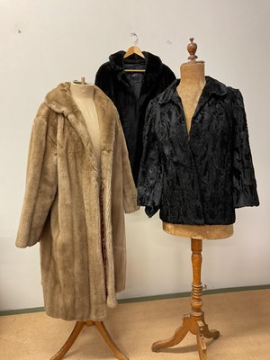 Lot 108 - A vintage black lamb jacket with a faux jacket...