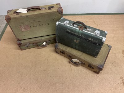 Lot 87 - Four military suitcases comprising three...