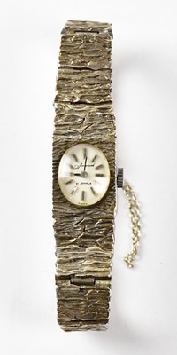 Lot 1184 - ACCURIST; a 925 silver bark-effect cocktail...