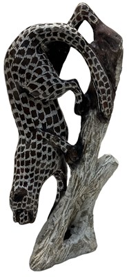 Lot 695 - A modern carved stone model of a jaguar...