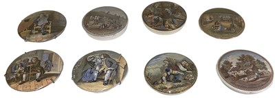 Lot 652 - A group of eight pot lids including 'Uncle...