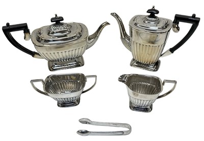 Lot 1095 - A Sheffield Plate four piece silver plated tea...