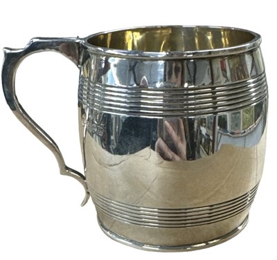 Lot 1189 - A George V hallmarked silver mug modelled as a...