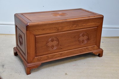 Lot 1063 - A Chinese carved rosewood blanket box, raised...