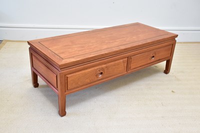 Lot 1108 - A Chinese rosewood low two drawer coffee table,...