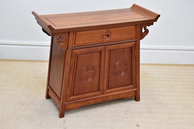 Lot 1064 - A reproduction Chinese rosewood altar cabinet,...