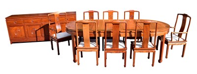 Lot 1057 - A Singapore rosewood dining suite comprising D-...