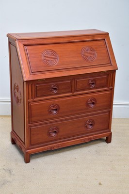 Lot 1065 - A Singapore rosewood bureau, the fall front...