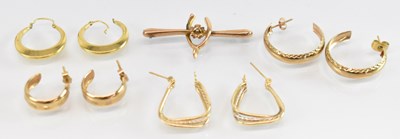 Lot 1323 - A pair of 14ct yellow and white gold earrings,...