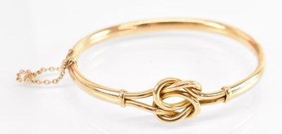 Lot 1269 - A 15ct yellow gold bangle, diameter 6.5cm,...